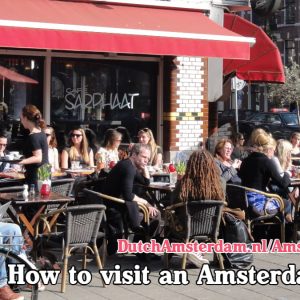 People at an outdoor cafe terrace in Amsterdam