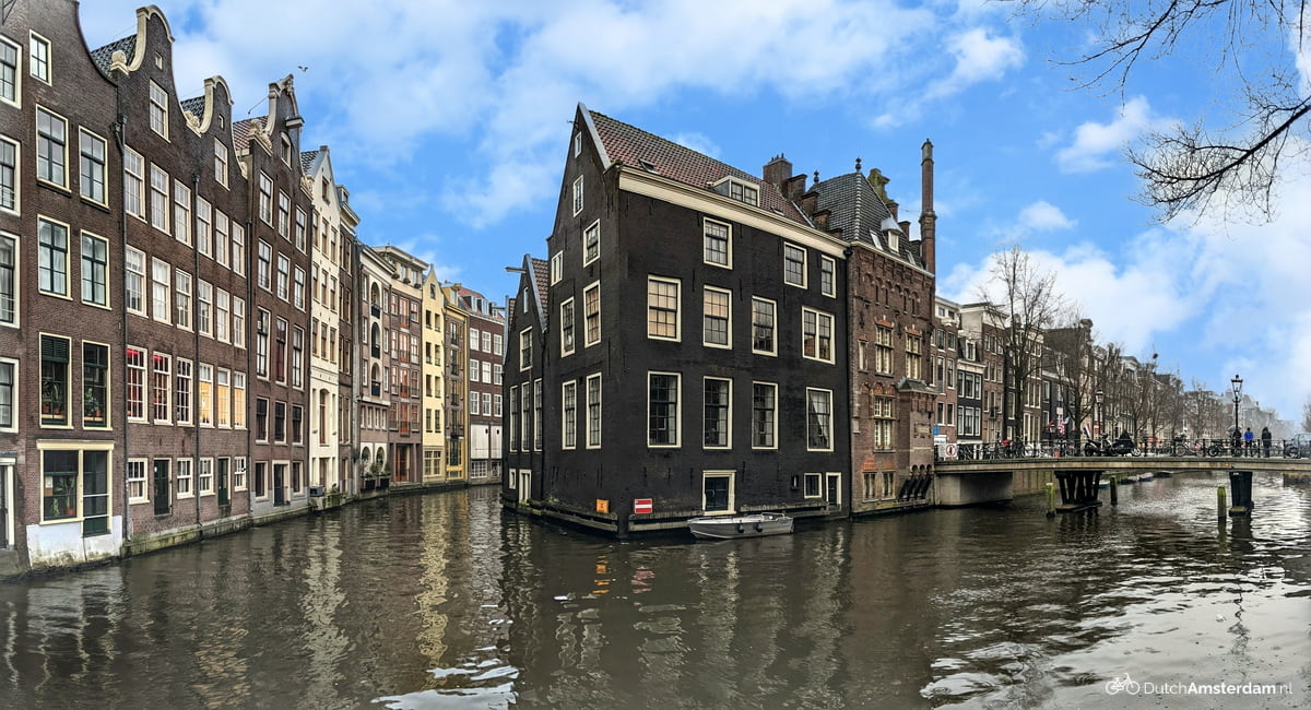 Houses along Zeedijk in Amsterdam are standing in the water of the Oudezijds Achterburgwal